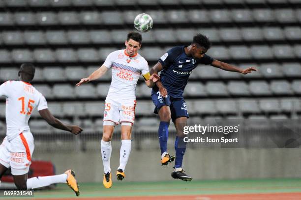 Vincent Le Goff of Lorient and Dylan Saint Louis of PFC during the French Ligue 2 match between Paris FC and Lorient at Stade Charlety on November 3,...