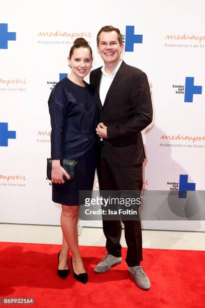 German actor and presenter Malte Arkona and his partner Anna-Maria Listl attend the 19th Media Award by Kindernothilfe on November 3, 2017 in Berlin,...