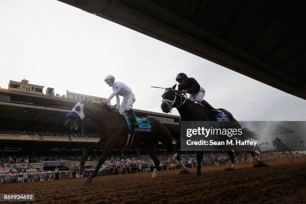 Battle Of Midway ridden by jockey Flavien Prat defeats Sharp Azteca ridden by jockey Paco Lopez to win the Las Vegas Breeder's Cup Dirt Mile on day...