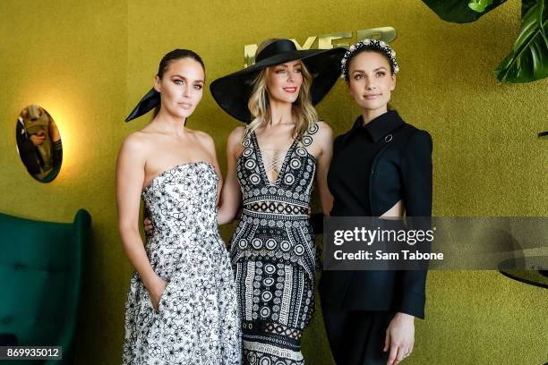 Jodi Gordon, Jennifer Hawkins and Rachael Finch pose at the Myer Marquee on Derby Day at Flemington Racecourse on November 4, 2017 in Melbourne,...