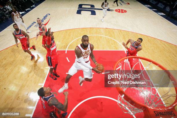 LeBron James of the Cleveland Cavaliers goes to the basket against the Washington Wizards on November 3, 2017 at Capital One Arena in Washington, DC....