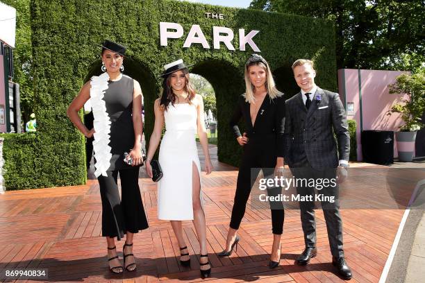 Maria Tutaia, Rebecca Harding, Georgia Connolly and Dalton Graham pose at The Park on AAMI Victoria Derby Day at Flemington Racecourse on November 4,...