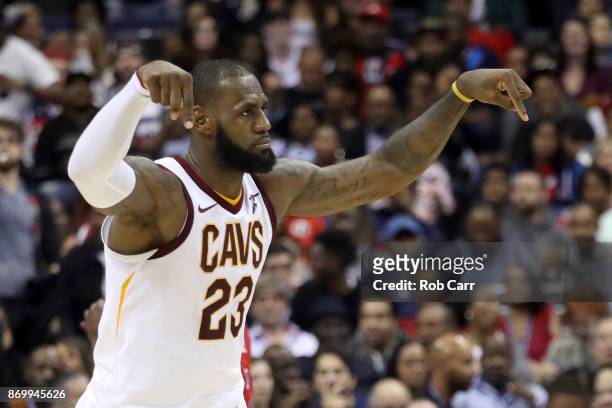 LeBron James of the Cleveland Cavaliers celebrates in the second half of the Cavaliers 130-122 win over the Washington Wizards at Capital One Arena...