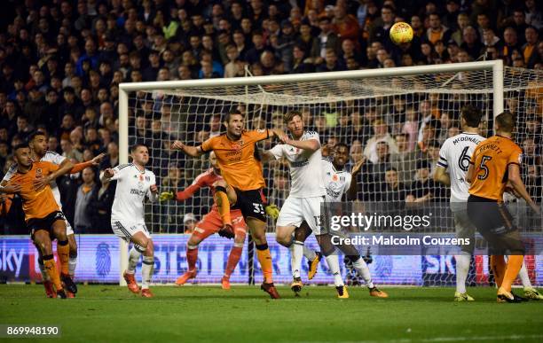 Leo Bonatini of Wolverhampton Wanderers and Tim Ream of Fulhan compete during the Sky Bet Championship match between Wolverhampton Wanderers and...