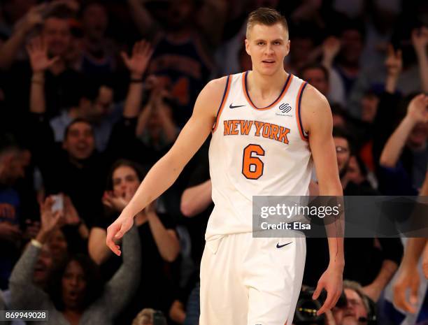Kristaps Porzingis of the New York Knicks reacts after a dunk in the fourth quarter against the Phoenix Suns at Madison Square Garden on November 3,...