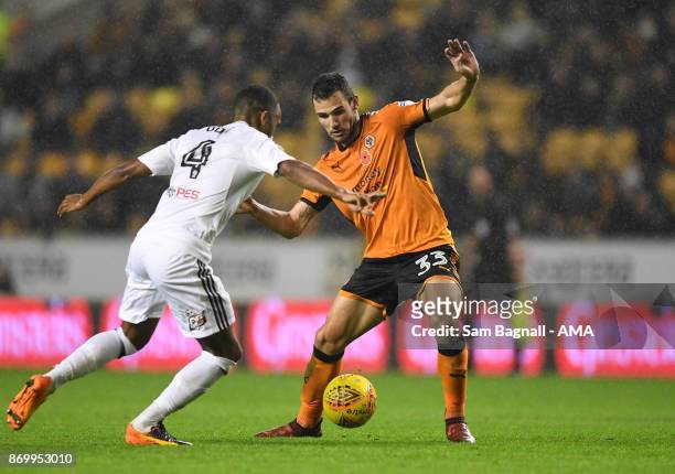 Denis Odoi of Fulham and Leo Bonatini of Wolverhampton Wanderers during the Sky Bet Championship match between Wolverhampton and Fulham at Molineux...