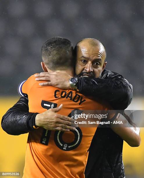 Nuno Espirito Santo manager / head coach of Wolverhampton Wanderers celebrates at full time with Conor Coady of Wolverhampton Wanderers during the...