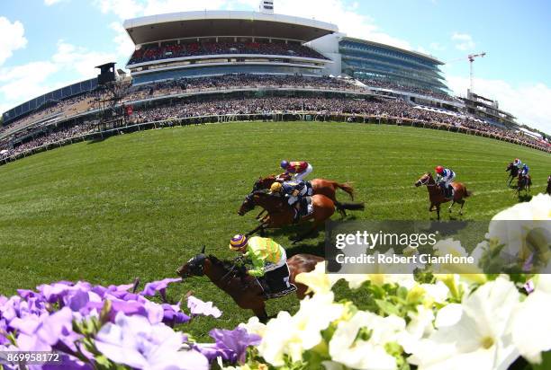 Stephen Baster riding Cismontane wins race four the Lexus Stakes on Derby Day at Flemington Racecourse on November 4, 2017 in Melbourne, Australia.