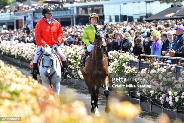 /j7 returns to the mounting yard aboard Cismontane after winning the Lexus Stakes at Flemington Racecourse on November 04, 2017 in Flemington,...
