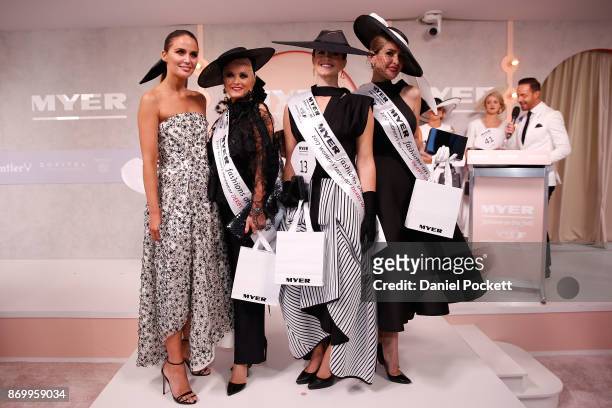 Women's Myer Fashions on the Field daily winner Montelle Mondello poses with second player winner Tanya Lazarou , third place winner Lisa March and...