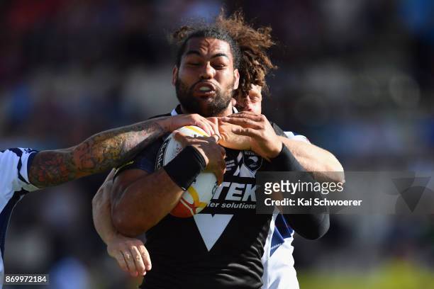 Adam Blair of the Kiwis is tackled during the 2017 Rugby League World Cup match between the New Zealand Kiwis and Scotland at AMI Stadium on November...
