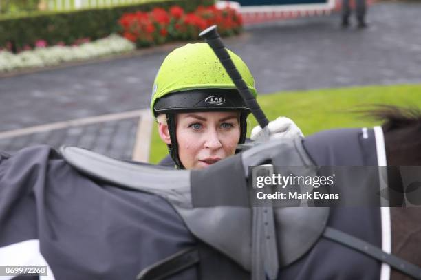Kathy O'Hara on Black on Gold returns to scale after winning during Sydney Racing at Rosehill Gardens on November 4, 2017 in Sydney, Australia.