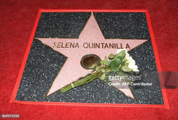 Singer Selena Quintanilla is honored posthumously with a Star on the Hollywood Walk of Fame on November 3 in Hollywood, California. / AFP PHOTO /...