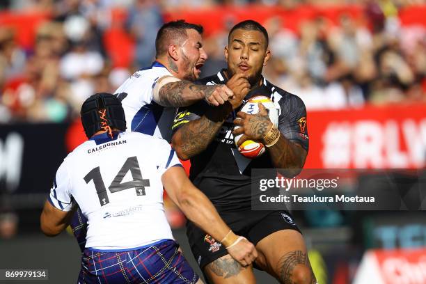 Addin Fonua-Blake of New Zealand is tackled during the 2017 Rugby League World Cup match between the New Zealand Kiwis and Scotland at AMI Stadium on...