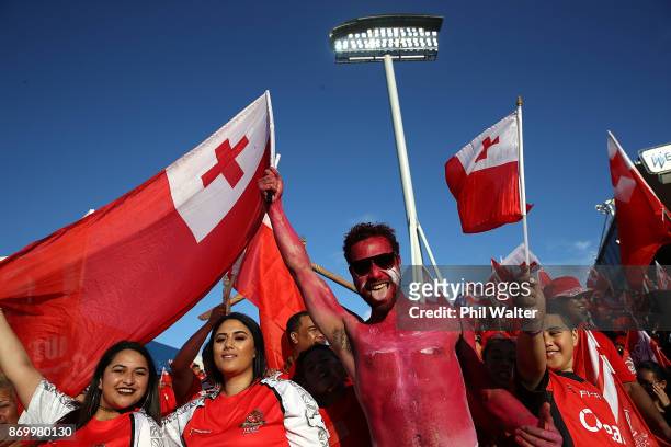 Tonga fans celebrate during the 2017 Rugby League World Cup match between Samoa and Tonga at Waikato Stadium on November 4, 2017 in Hamilton, New...