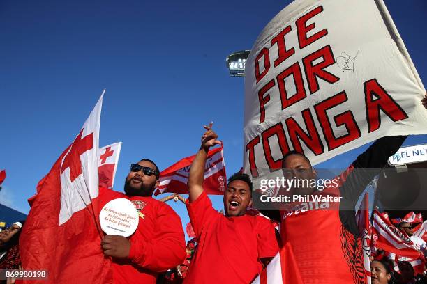 Tonga fans celebrate during the 2017 Rugby League World Cup match between Samoa and Tonga at Waikato Stadium on November 4, 2017 in Hamilton, New...