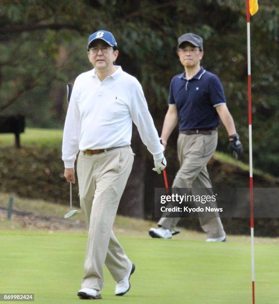 Japanese Prime Minister Shinzo Abe plays golf in Chigasaki, Kanagawa Prefecture, on Nov. 3, 2017. Abe played nine holes in about two hours, the first...