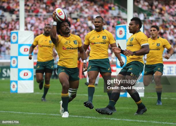 Henry Speight of Australia celebrates after scoring their second try during the rugby union international match between Japan and Australia Wallabies...