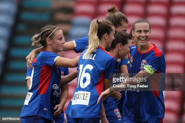 Emily Van Egmond of the Jets celebrates a goal with team mates during the round two W-League match between the Newcastle Jets and Sydney FC at...