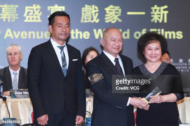 Director John Woo and his wife Annie Woo attend the press conference of the 2nd International Film Festival & Awards Macao on November 3, 2017 in...