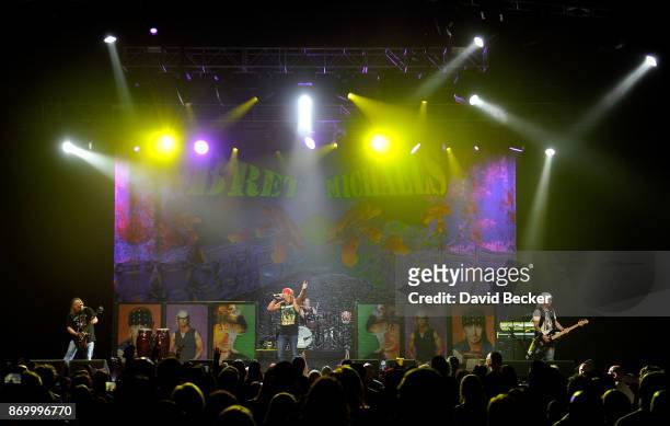 Guitarist Pete Evick of the Bret Michaels Band, recording artist Bret Michaels, drummer Mike Bailey and bassist Eric Brittingham of the Bret Michaels...