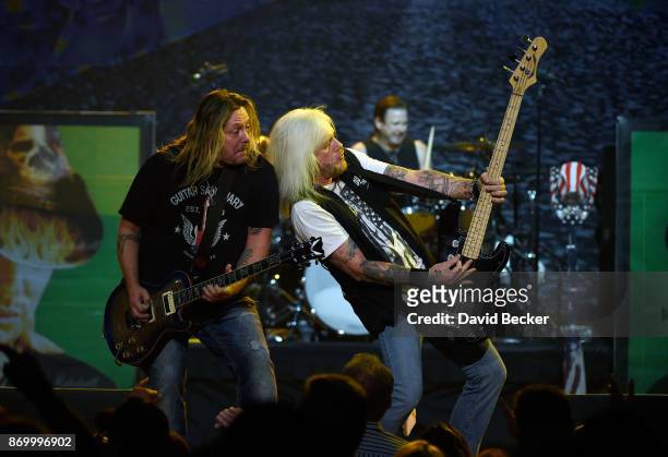 Guitarist Pete Evick and bassist Eric Brittingham of the Bret Michaels Band perform at The Joint inside the Hard Rock Hotel & Casino on November 3,...