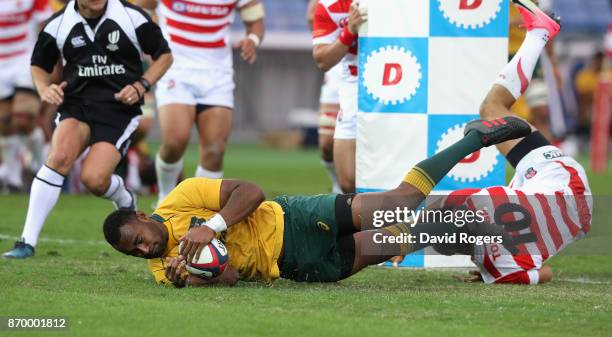 Tevita Kuridrani of Australia dives over for his third try during the rugby union international match between Japan and Australia Wallabies at Nissan...