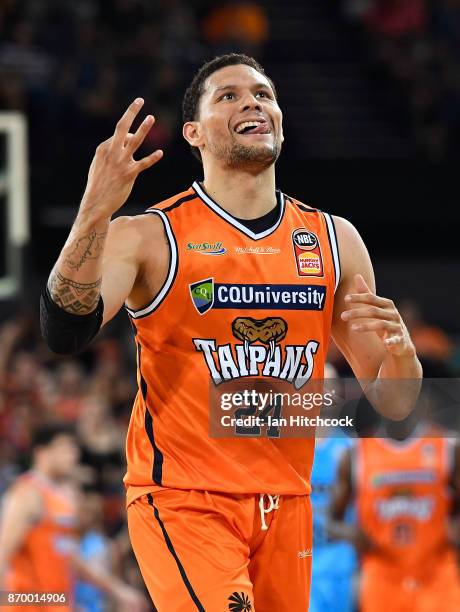 Michael Carrera of the Taipans reacts after scoring a three point shot during the round five NBL match between the Cairns Taipans and the New Zealand...