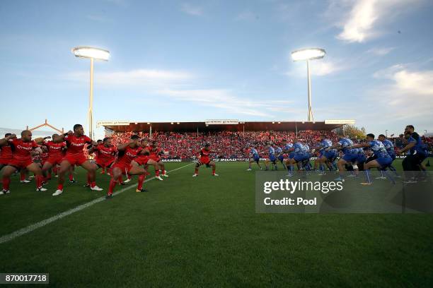 Tonga and Samoa perform the Haka during the 2017 Rugby League World Cup match between Samoa and Tonga at Waikato Stadium on November 4, 2017 in...