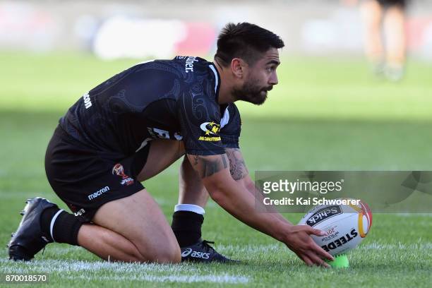 Shaun Johnson of the Kiwis looks to kick a conversion during the 2017 Rugby League World Cup match between the New Zealand Kiwis and Scotland at AMI...