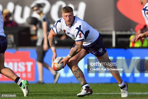 Lachlan Stein of Scotland looks to pass the ball during the 2017 Rugby League World Cup match between the New Zealand Kiwis and Scotland at AMI...