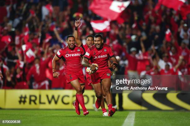 Manu Ma'u of Tonga runs in a try during the 2017 Rugby League World Cup match between Samoa and Tonga at Waikato Stadium on November 4, 2017 in...