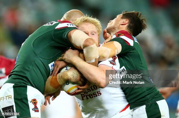 James Graham of England is tackled during the 2017 Rugby League World Cup match between England and Lebanon at Allianz Stadium on November 4, 2017 in...