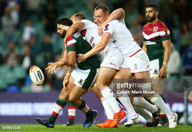 Nick Kassis of Lebanon offloads during the 2017 Rugby League World Cup match between England and Lebanon at Allianz Stadium on November 4, 2017 in...