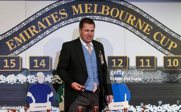 Joe Chambers draws barrier 21 for Thomas Hobson during The Melbourne Cup Barrier Draw at Flemington Racecourse on November 04, 2017 in Flemington,...