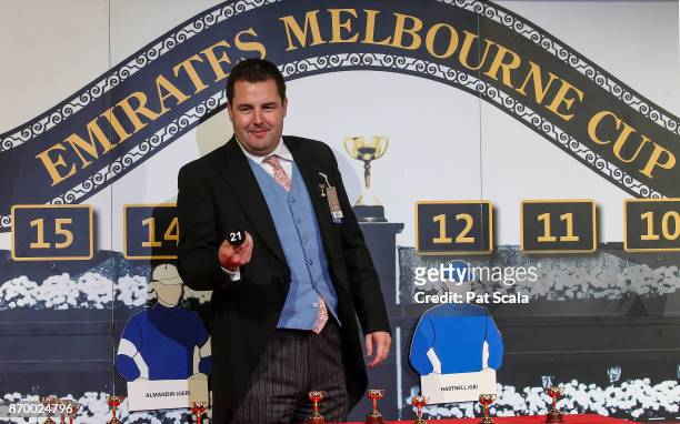 Joe Chambers draws barrier 21 for Thomas Hobson during The Melbourne Cup Barrier Draw at Flemington Racecourse on November 04, 2017 in Flemington,...