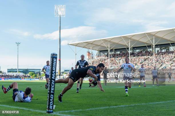 Peta Hiku of the Kiwis dives over to score a try during the 2017 Rugby League World Cup match between the New Zealand Kiwis and Scotland at AMI...
