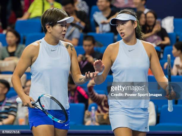 Chen Liang and Zhaoxuan Yang of China talk during the doubles Round Robin match of the WTA Elite Trophy Zhuhai 2017 against Ying-Ying Duan and Xinyun...