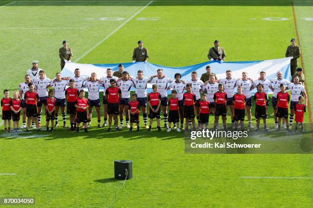 Scotland line up for their naticonal anthem prior to the 2017 Rugby League World Cup match between the New Zealand Kiwis and Scotland at AMI Stadium...