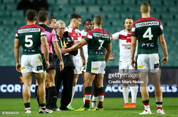 Robbie Farah of Lebanon makes an official complaint of biting against Jermaine McGillvary of England during the 2017 Rugby League World Cup match...