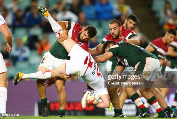 Jamie Clark of Lebanon up ends Sean O'Loughlin of England during the 2017 Rugby League World Cup match between England and Lebanon at Allianz Stadium...