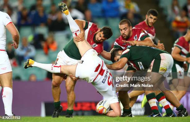 Jamie Clark of Lebanon up ends Sean O'Loughlin of England during the 2017 Rugby League World Cup match between England and Lebanon at Allianz Stadium...
