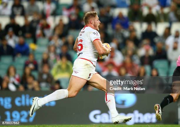 Thomas Burgess of England makes a line break to score during the 2017 Rugby League World Cup match between England and Lebanon at Allianz Stadium on...