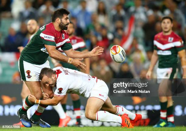 Nick Kassis of Lebanon offloads during the 2017 Rugby League World Cup match between England and Lebanon at Allianz Stadium on November 4, 2017 in...