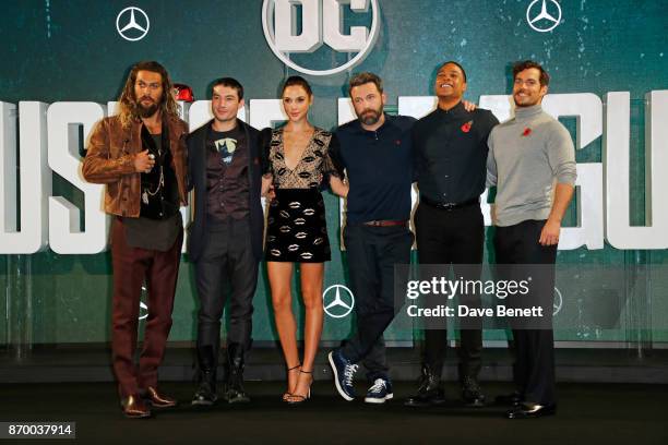 Jason Momoa, Ezra Miller, Gal Gadot, Ben Affleck, Ray Fisher and Henry Cavill attend the "Justice League" photocall at The College on November 4,...