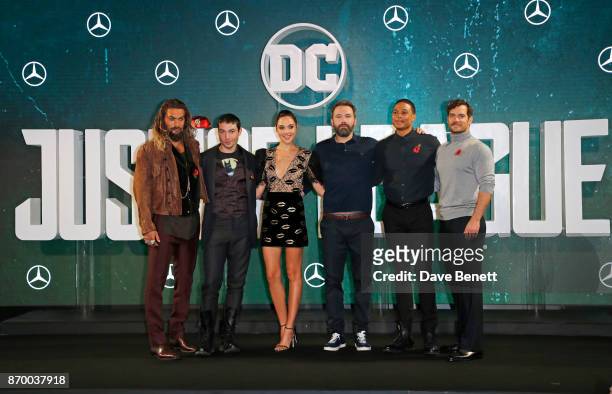 Jason Momoa, Ezra Miller, Gal Gadot, Ben Affleck, Ray Fisher and Henry Cavill attend the "Justice League" photocall at The College on November 4,...