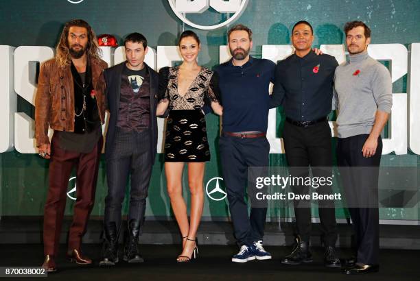 Jason Momoa, Ezra Miller, Gal Gadot, Ben Affleck, Ray Fisher and Henry Cavill attend the "Justice League" photocall at The College on November 4,...