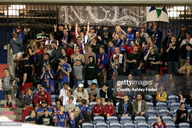 Jets fans celebrate during the round five A-League match between the Newcastle Jets and the Wellington Phoenix at McDonald Jones Stadium on November...