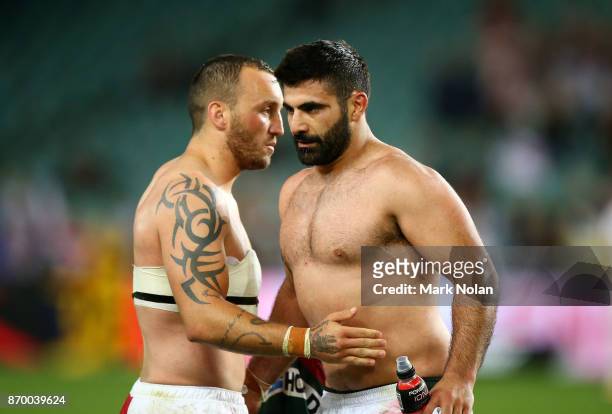 Josh Hodgson of England and Nick Kassis of Lebanon exchange jumpers after the 2017 Rugby League World Cup match between England and Lebanon at...