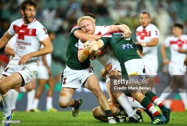 James Graham of England is tackled during the 2017 Rugby League World Cup match between England and Lebanon at Allianz Stadium on November 4, 2017 in...